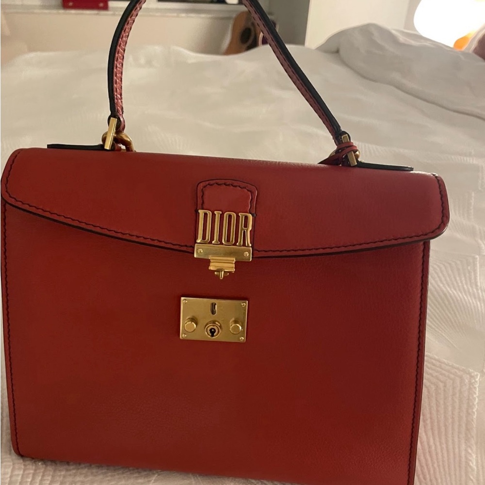 Dior handbag with handle and strap. Pristine condition with dust bag